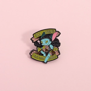 Cute Dice Goblin enamel pin with blue monster and D20 dice for tabletop RPG fans