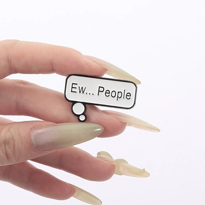 Creative speech bubble enamel pin with Ew People text design in black and white finish