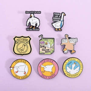 Set of 8 funny goose enamel pins with cartoon muscle goose and silly goose designs