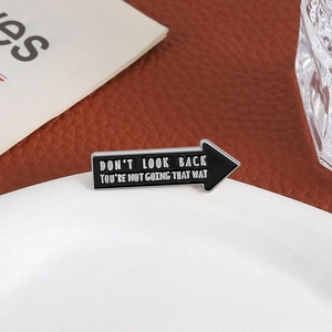 Arrow enamel pin with motivational quote Don't Look Back for clothes and backpacks