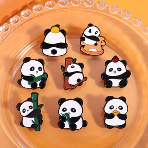 Set of 8 cute panda enamel pins with bamboo and apple designs for backpack decoration