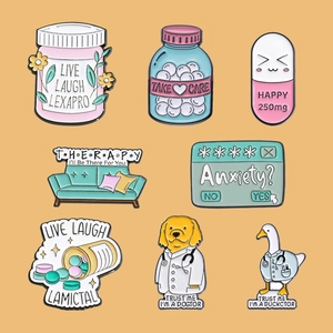 Ensemble de pin's émaillés humour santé mentale avec flacons de médicaments sur fond orange