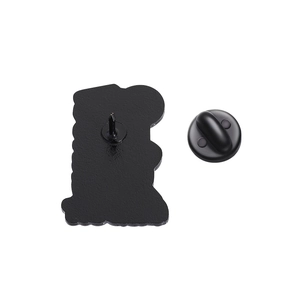 Detailed macro view of the black matte enamel pin back with durable rubber butterfly clutch