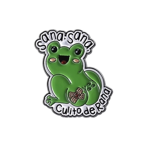 Pin de esmalte de rana verde con la frase curativa tradicional Sana sana Culito de Rana