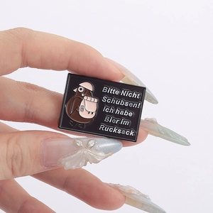 Cartoon bird enamel pin badge with German text Bitte Nicht Schubsen Ich habe Bier im Rucksack