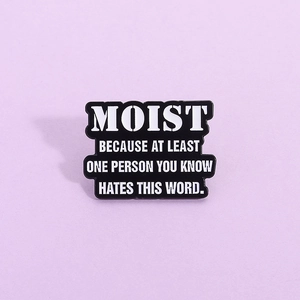Minimalist black and white enamel pin with humorous English quote on lavender background