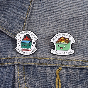 Funny cartoon dumpster fire enamel pins set for clothing decoration on denim jacket