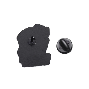 Detailed back view of a black enamel cat pin showing sandblasted alloy finish and rubber clasp