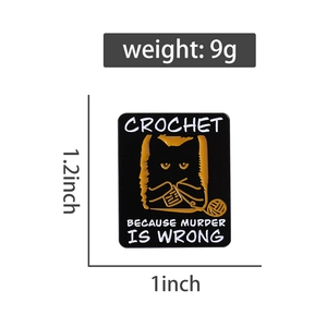 Detail view of black enamel cat brooch with size 1.2x1 inch and 9g weight specs
