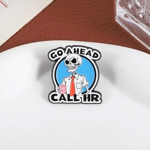 Funny skeleton enamel pin featuring Go Ahead Call HR text on a vibrant blue background