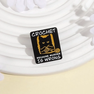 Creative black cat enamel brooch with Crochet Because Murder Is Wrong text design