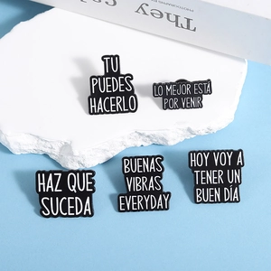 Set of 5 inspirational enamel pins with Spanish quotes on black metal for jackets
