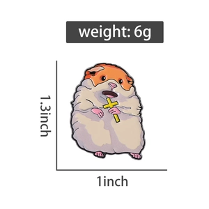 Detail view of cartoon hamster enamel pin with cross, measuring 1.3 by 1 inch and weighing 6g