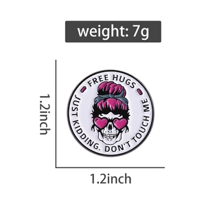 Detail view of round enamel pin showing size 1.2 inches and weight 7g for pink skull badge
