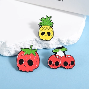Cartoon fruit skull enamel pin set featuring pineapple strawberry and cherry badges