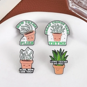 Outdoor series of green plant enamel pins featuring clever plant puns on metal badges