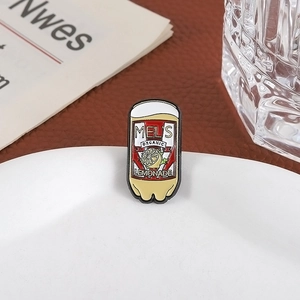 Retro Mel's Organic Lemonade enamel soda bottle pin with lemon icon on white plate