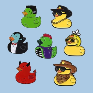 Set of 7 colorful cartoon duck enamel pins made of zinc alloy with diverse themes