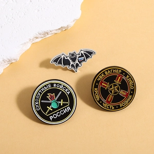 Dark punk bat and round military style metal badges with Russian flag elements
