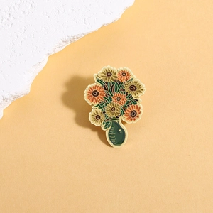 Artistic Van Gogh inspired enamel brooch with yellow sunflowers in a green vase