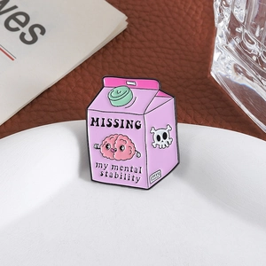 Pink brain soda carton enamel pin with Missing My Mental Stability text design