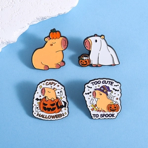 Set of four cute Halloween capybara enamel pins with pumpkin and ghost themes