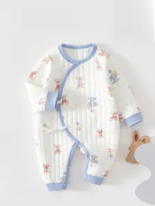 Quilted cotton newborn onesie with animal prints and secure side button closure