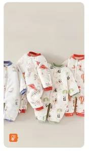 Detail showing four cartoon patterns on warm thick cotton baby winter jumpsuits