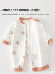 Detail of padded baby romper with bear print and convenient snap closure design