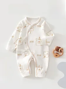 Detail of baby long sleeve romper with cute bear prints and side-tie cotton design