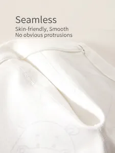 Soft cotton baby romper detail showing seamless four-needle six-thread stitching technology