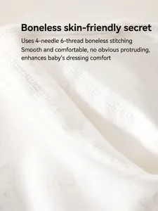 Macro shot of seamless boneless stitching on soft white cotton baby romper bodysuit