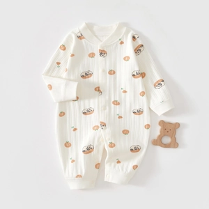Detail of baby long sleeve romper featuring panda print and ribbed cotton texture