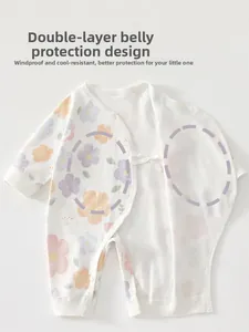 Detail of baby cotton jumpsuit featuring double-layer tummy protection and rabbit pattern