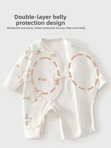 Detail of baby cotton romper with double-layer belly protection and bear prints