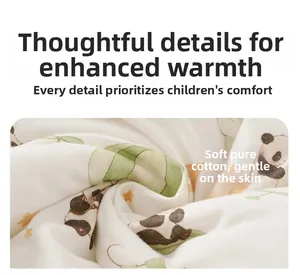 Close-up of soft white cotton fabric featuring cute cartoon pandas and star prints