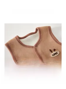Detailed view of kids warm fleece vest featuring a cozy collar and cute bunny ear embroidery