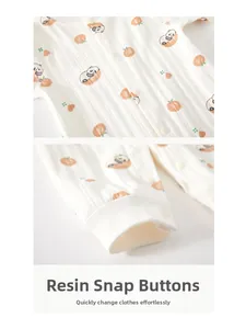 Detail of baby romper with resin snap buttons and breathable cotton ribbed texture