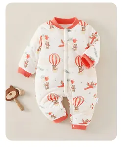 Close-up of baby winter romper featuring cute bear prints and soft cotton padding detail