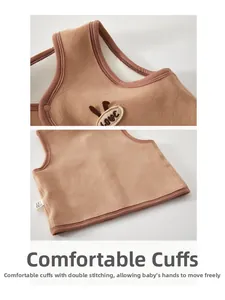 Detail of warm brown baby fleece vest showing double stitching and LOVE embroidery