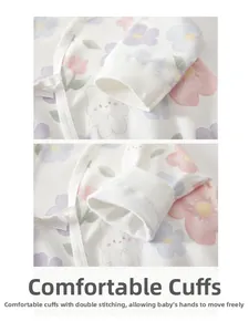 Close-up of comfortable cotton cuffs with cute floral and rabbit prints for baby romper