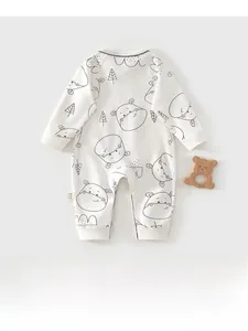 Close-up of baby long-sleeve cotton romper featuring a cute blue hippo all-over print