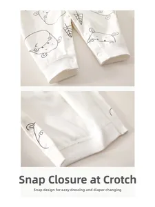Détails de l'entrejambe à pressions et motif hippopotame sur le pyjama bébé en coton doux