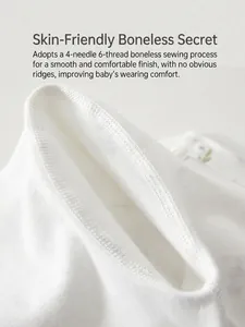 White cotton baby bodysuit featuring 4-needle 6-thread flatlock stitching and floral print