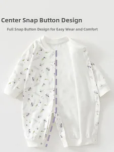 Close-up of baby romper with floral print and convenient full-length snap button design