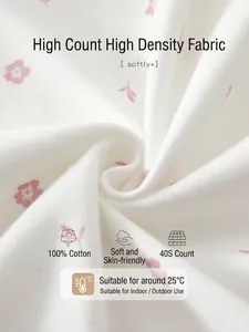 Soft white floral baby romper in 100% organic cotton for newborn spring wear