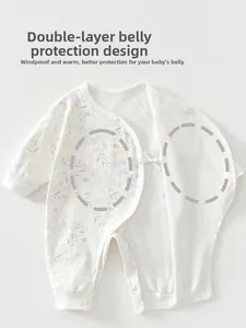Detail view of cotton baby romper featuring a double-layer tummy protection design
