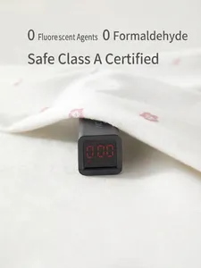 Safety testing for newborn cotton romper showing zero formaldehyde on digital detector