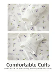 Detailed macro view of baby romper ribbed cuffs with purple berry print and durable stitching