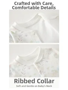 Detail of baby cotton jumpsuit bound neckline with floral print and snaps